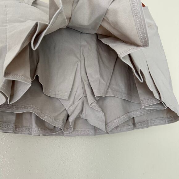 PrettyLittleThing Stone Pleated Drop V Front Miniskirt US Size 12 - Picture 6 of 9